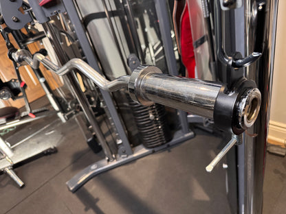 Andreoni cable barbell collars on an EZ curl bar