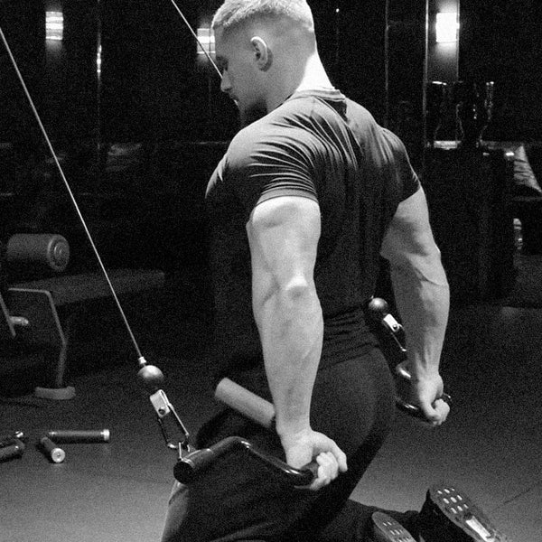 Straight-arm cable pulldown with Andreoni Bar for increased range of motion